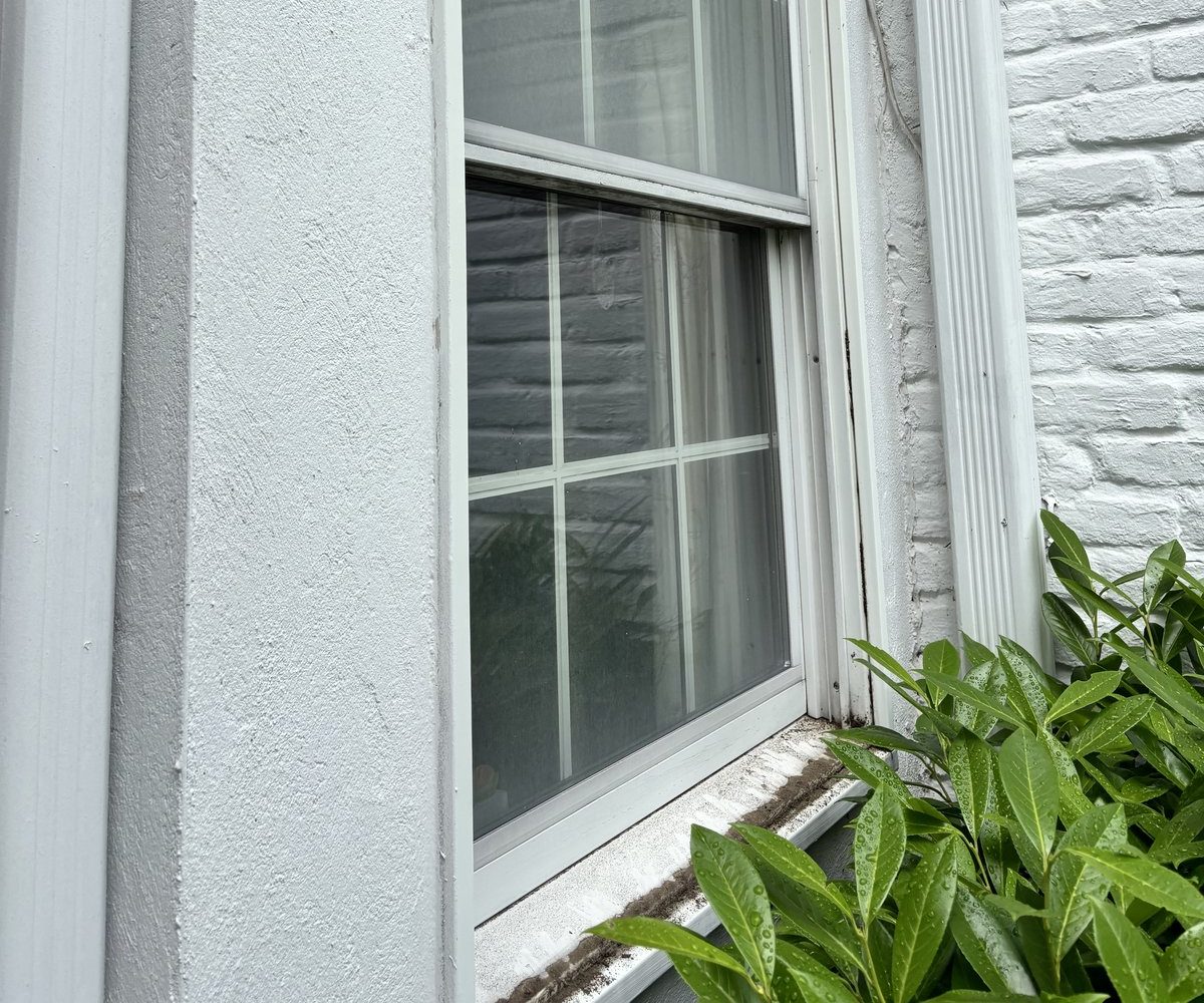 Windows with moderate buildup of dust and streaks